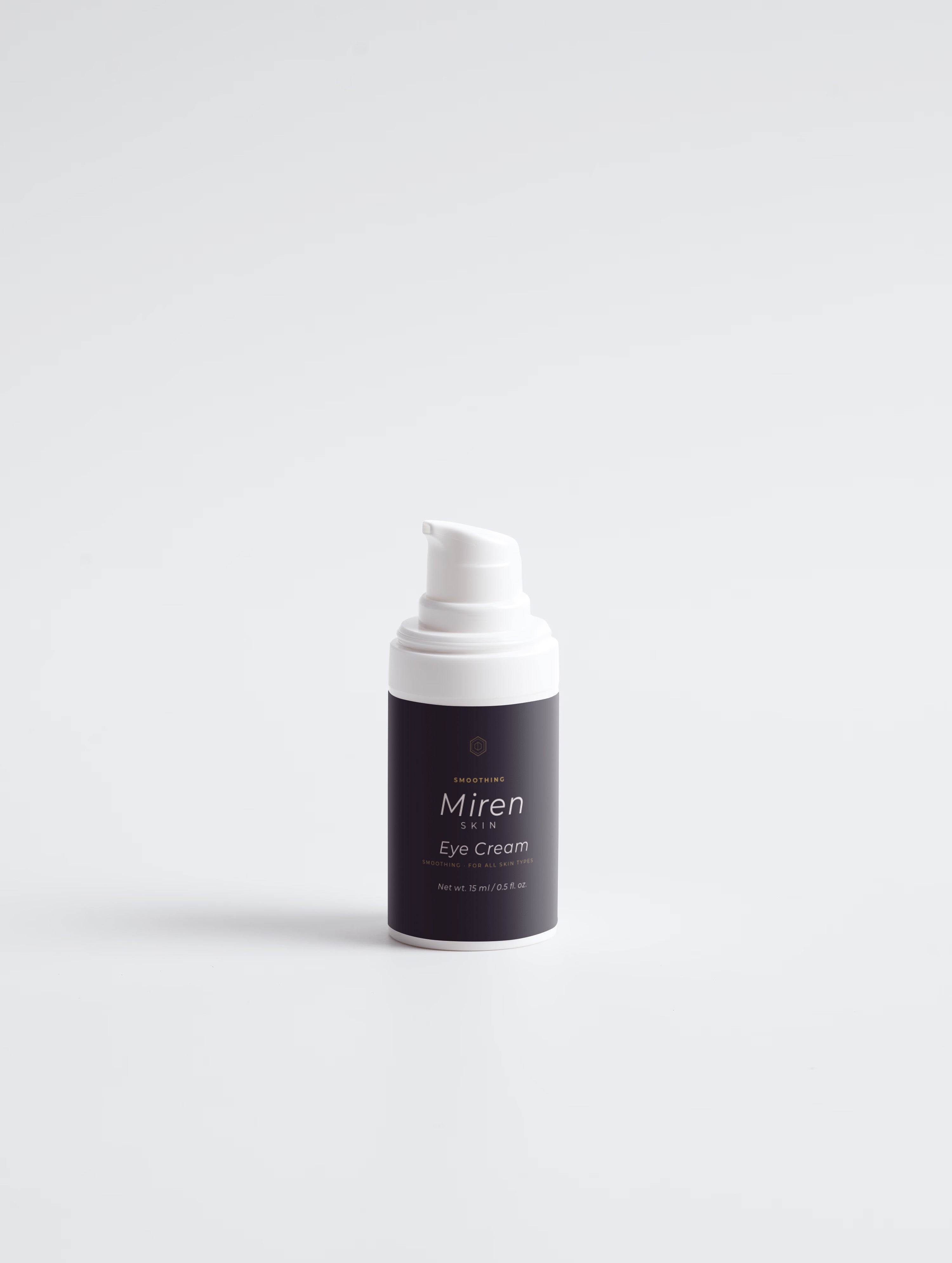 MirenSkin Age-Defying Glow Trio skincare set on stone