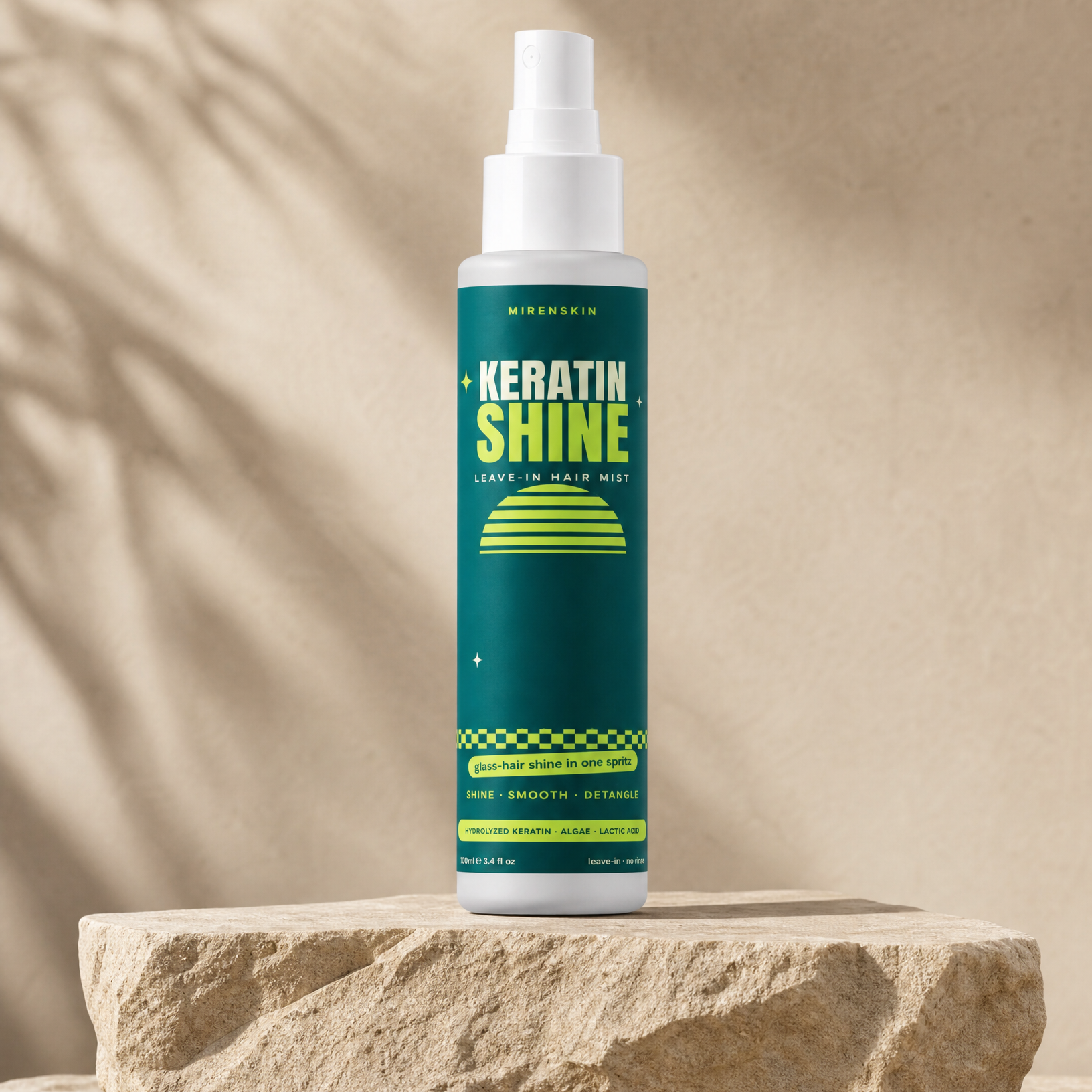 MirenSkin Keratin Shine Leave-In Hair Mist on natural stone