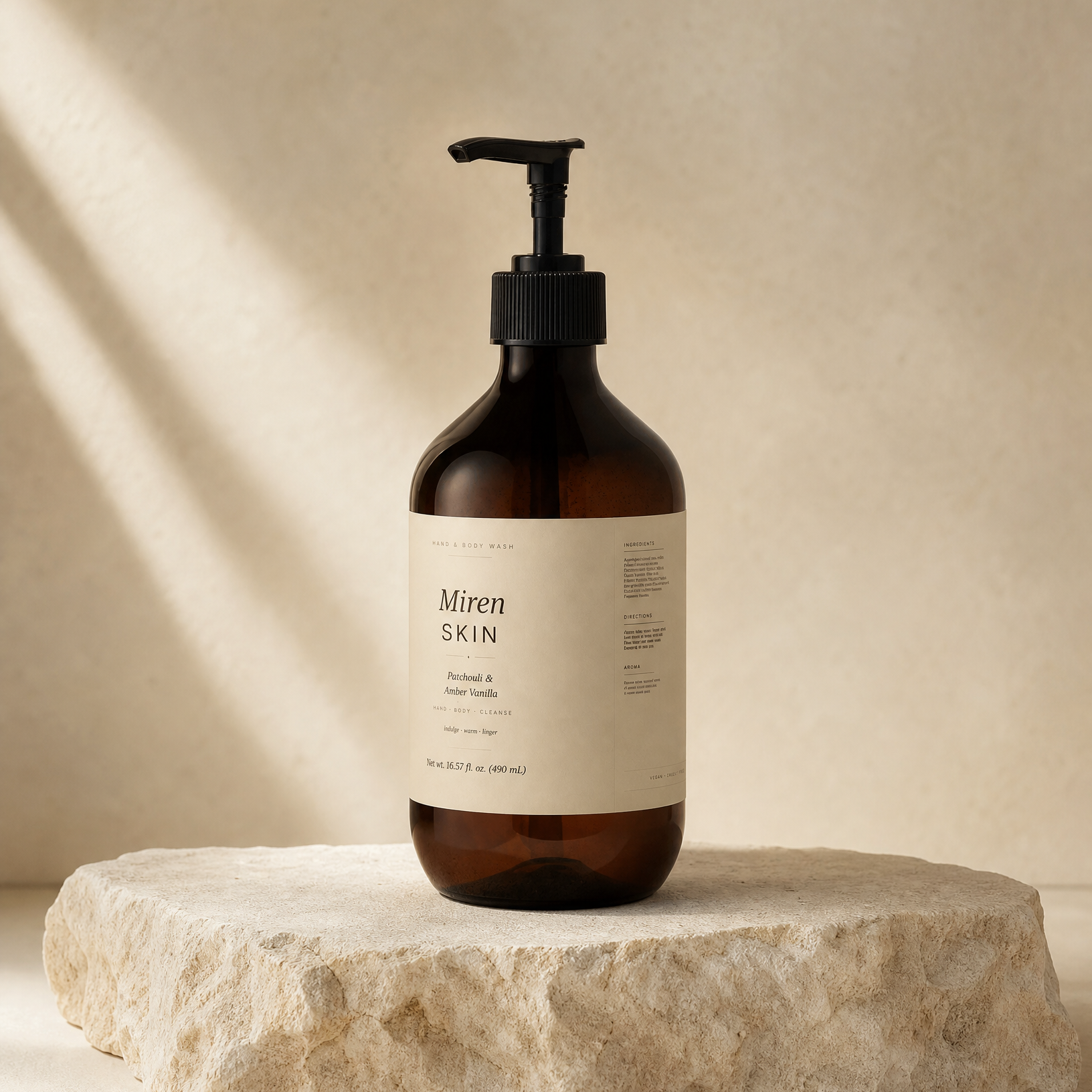 MirenSkin Patchouli & Amber Vanilla Hand & Body Cleanser on natural stone