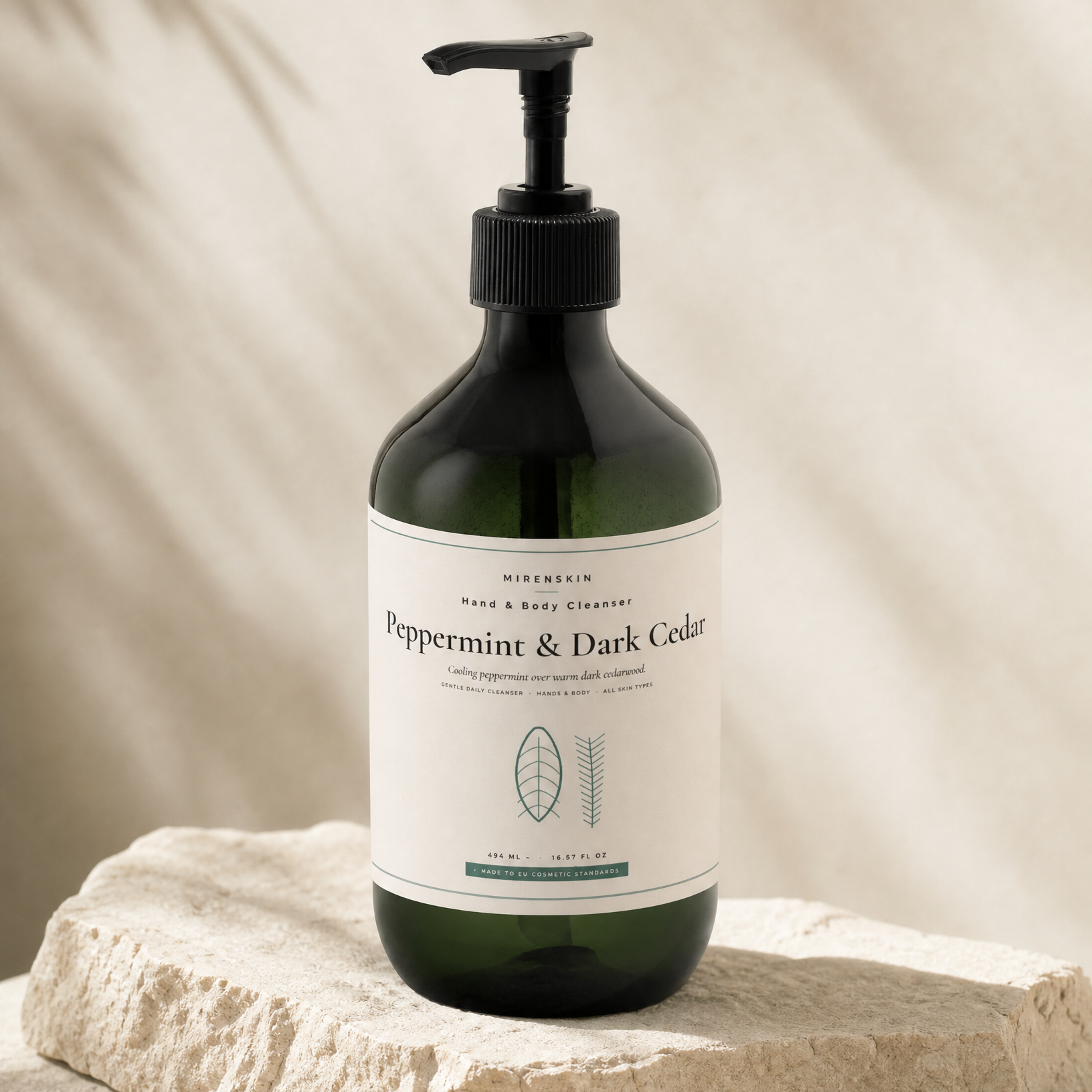 MirenSkin Peppermint & Dark Cedar Hand & Body Cleanser on natural stone